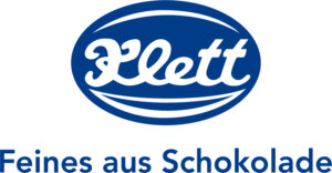 Blaues Klett-Logo mit Slogan „Feines aus Schokolade“